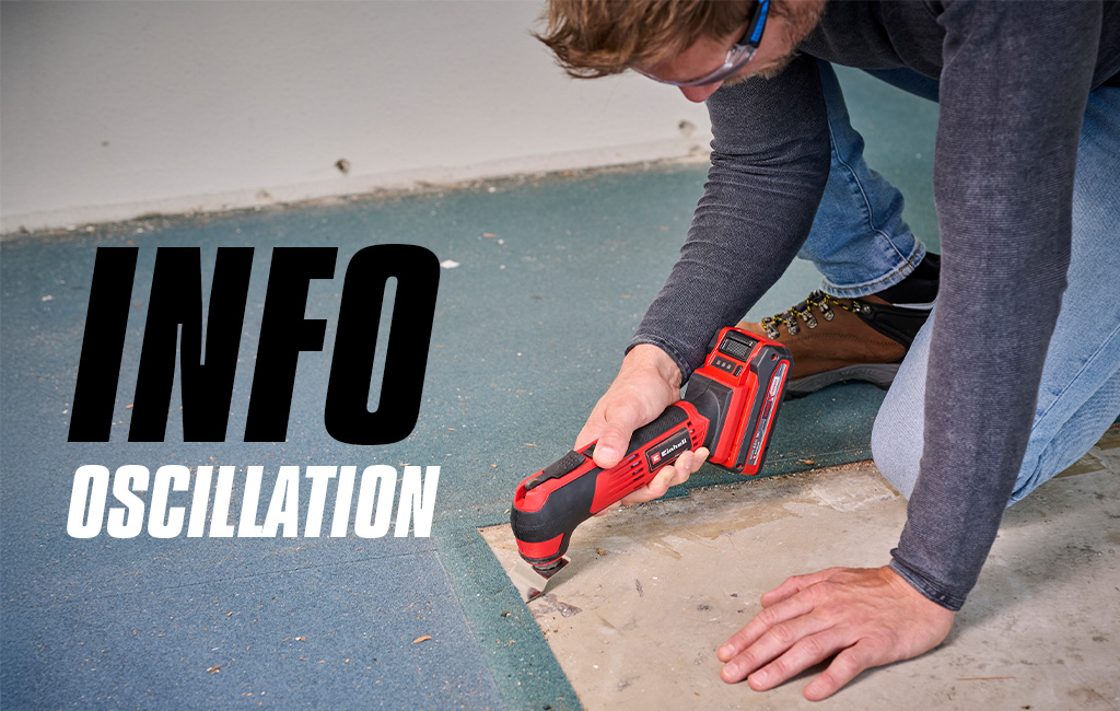 Muškarac koristi Einhell akumulatorski multitool za uklanjanje podne obloge na rubu, s natpisom „Info osciliranje” na slici.