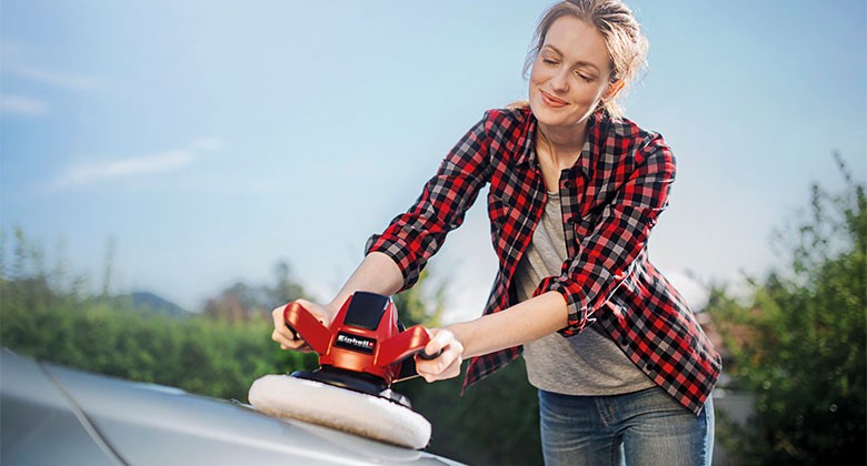 woman using a polishing machine
