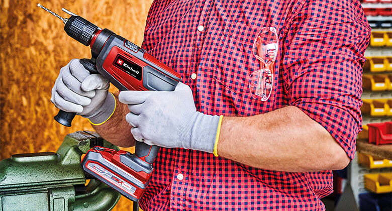 man using a cordless impact drill from Einhell
